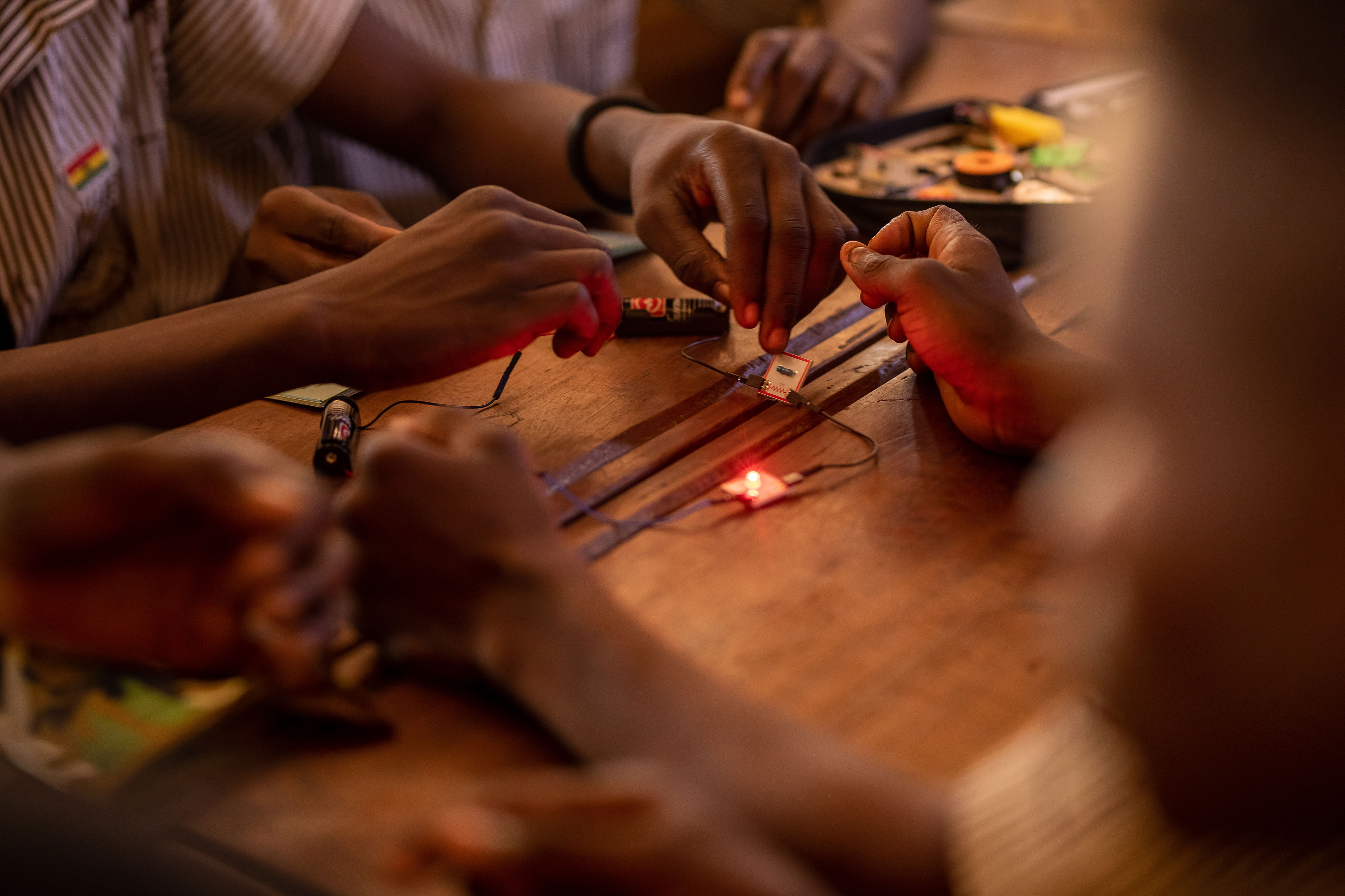 Students at Otinibi building circuits